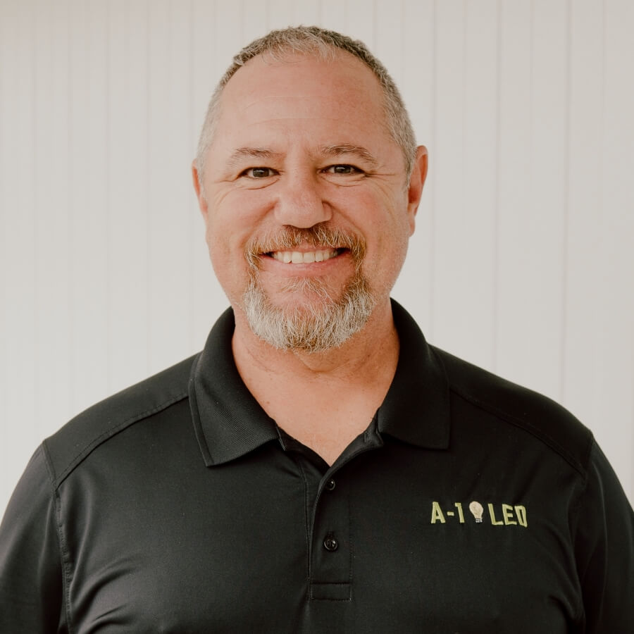 Larry Mears, Energy Reduction Specialist at A-1 LED, sports a confident smile in his headshot, suggesting his deep expertise in helping businesses save energy with LED lighting.